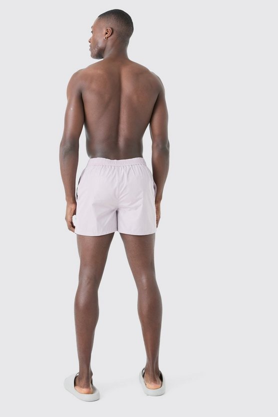 Kurze Badehose mit Druckknöpfen