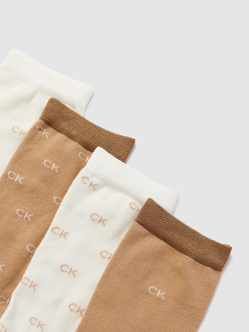 Socken mit elastischen Abschlüssen im 4er-Pack in offwhite