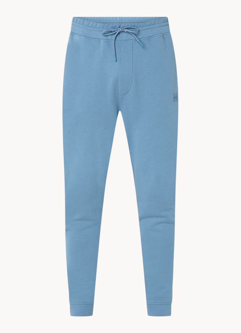 Pantaloni de trening slim fit de la HUGO BOSS, cu logo și buzunare laterale.