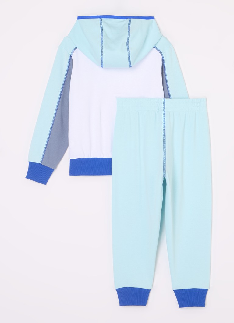 Dwuczęściowy komplet Nike: bluza z kapturem i spodnie dresowe.