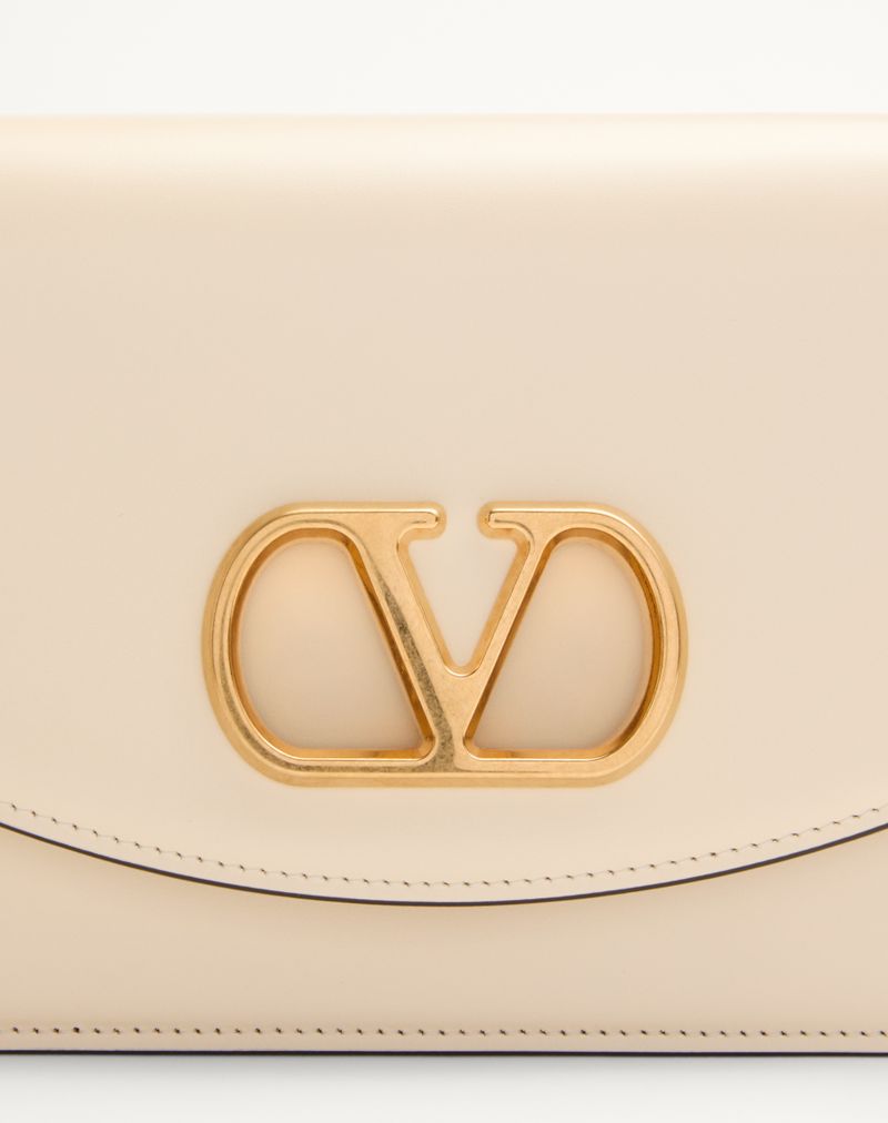 Bolsa de ombro pequena Valentino Garavani Vain em couro de bezerro brilhante