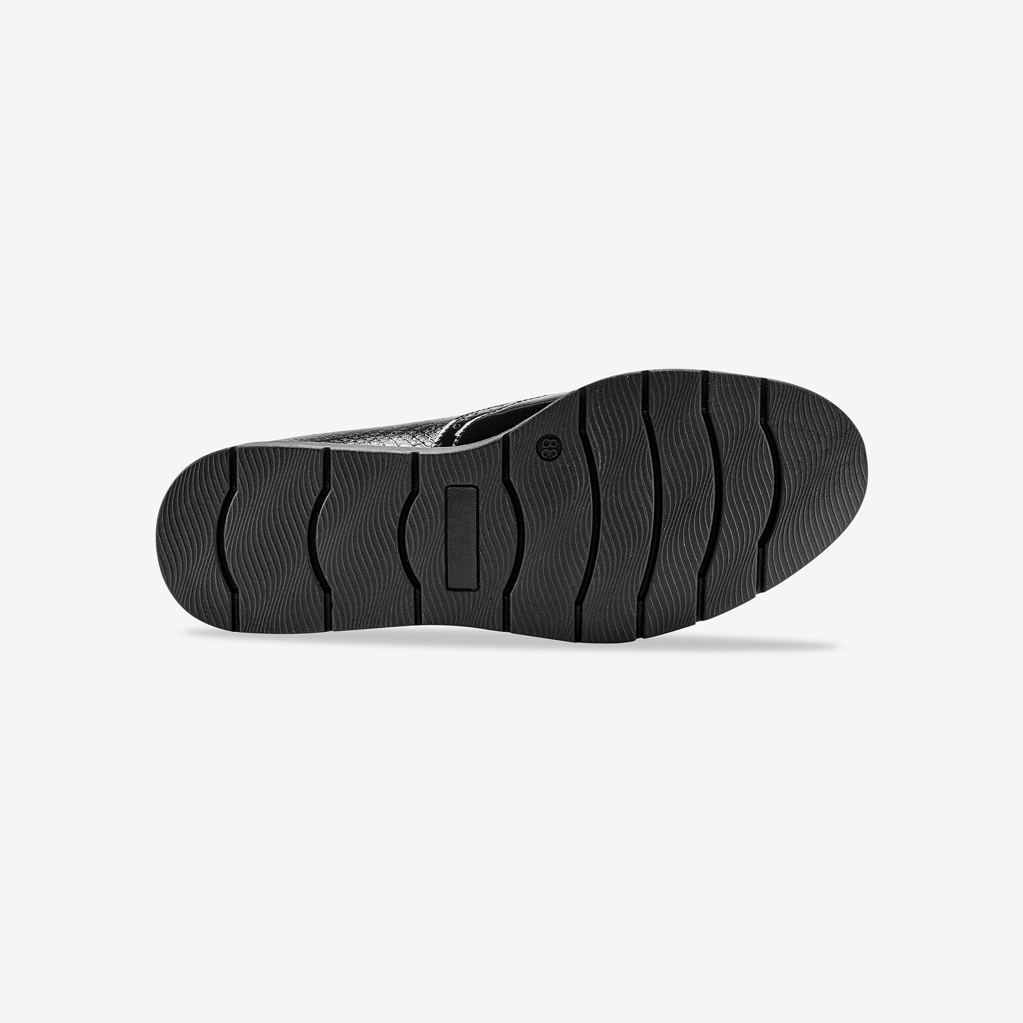 Mocassins compensés à franges et pompons