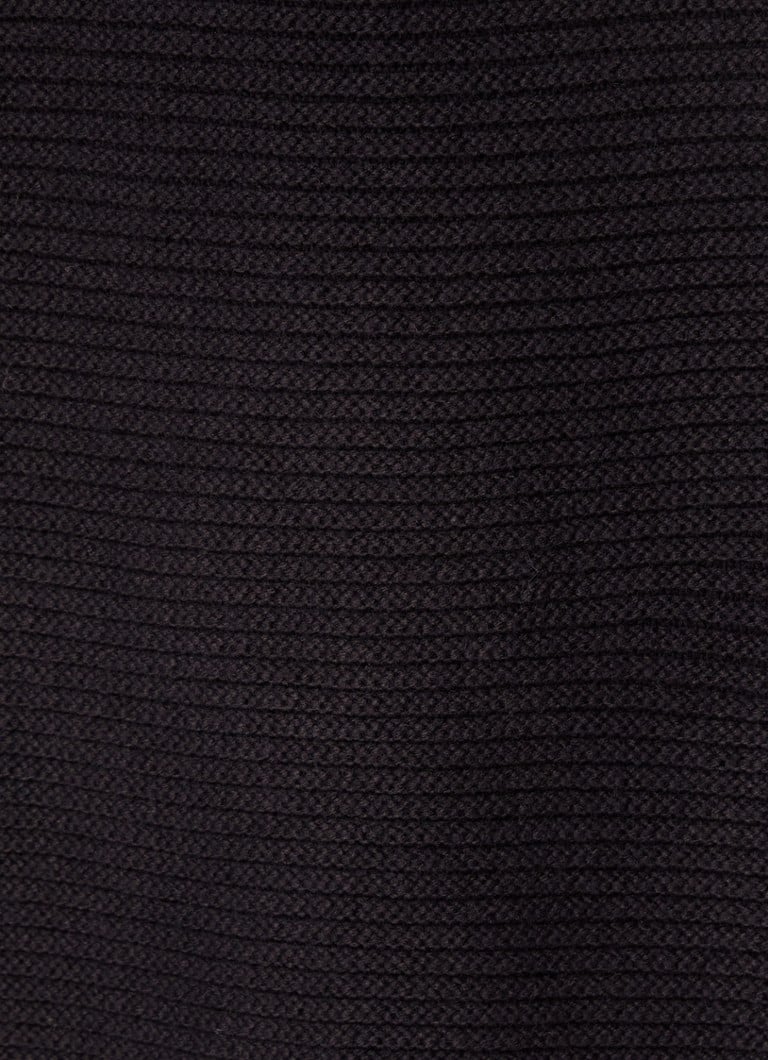 Puloverul esențial fără mâneci Antwerp Glove are o croială lejeră și este confecționat dintr-un tricot fin cu broderie.