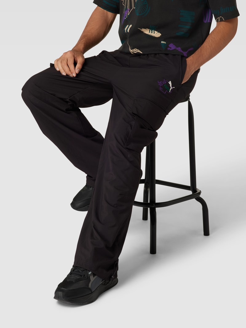 Cargohose mit Eingrifftaschen - PUMA X P&C* in schwarz