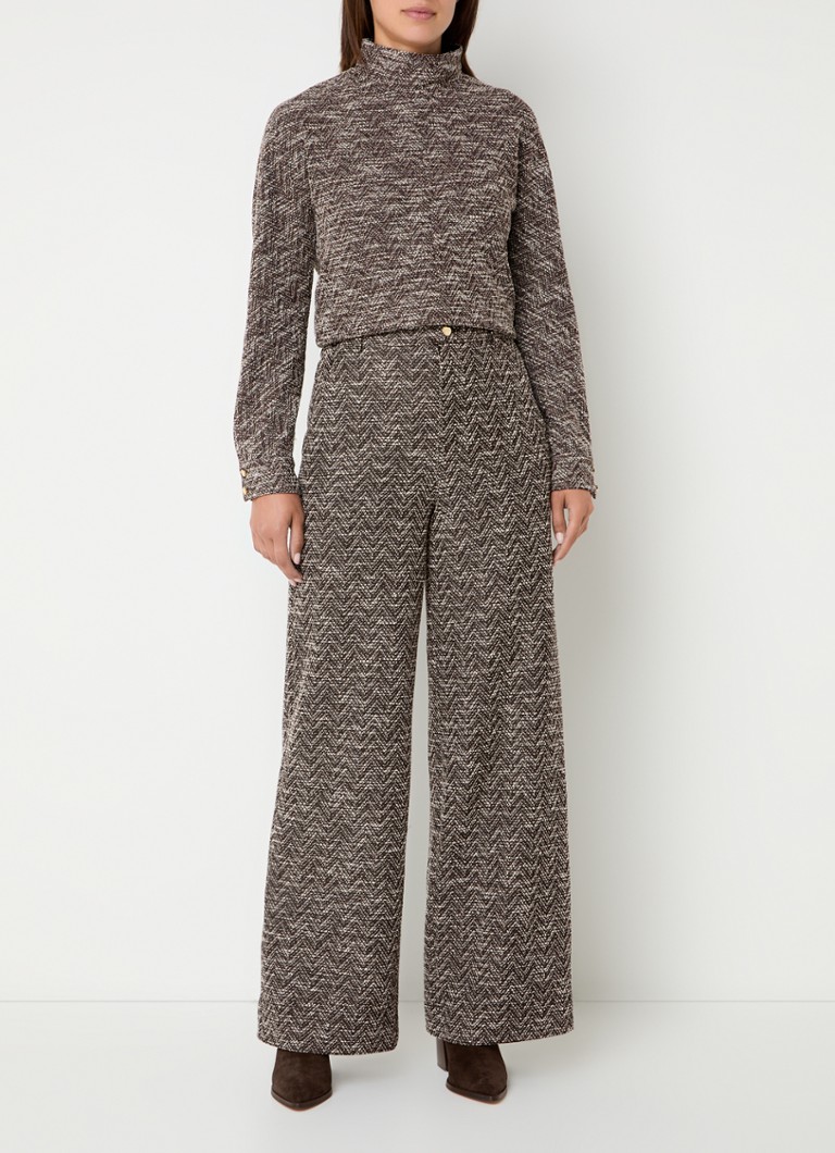 Top color vaniglia effetto tweed con collo alto