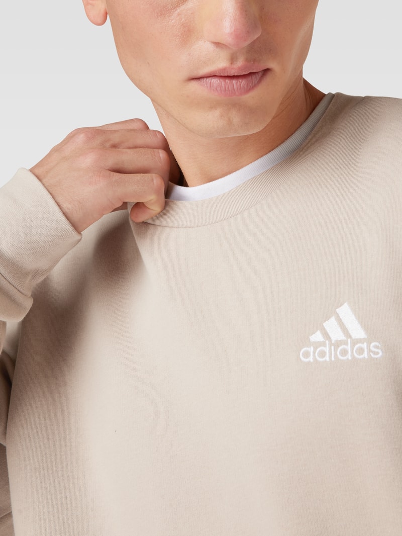 Sweatshirt mit Rundhalsausschnitt Modell 'FEELCOZY' in beige