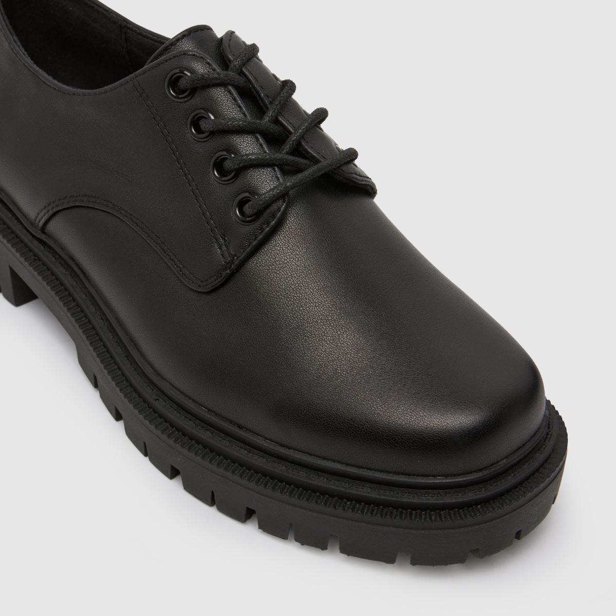Schuh – Wide Fit – Leonora – Svarta platta skor i läder med snörning