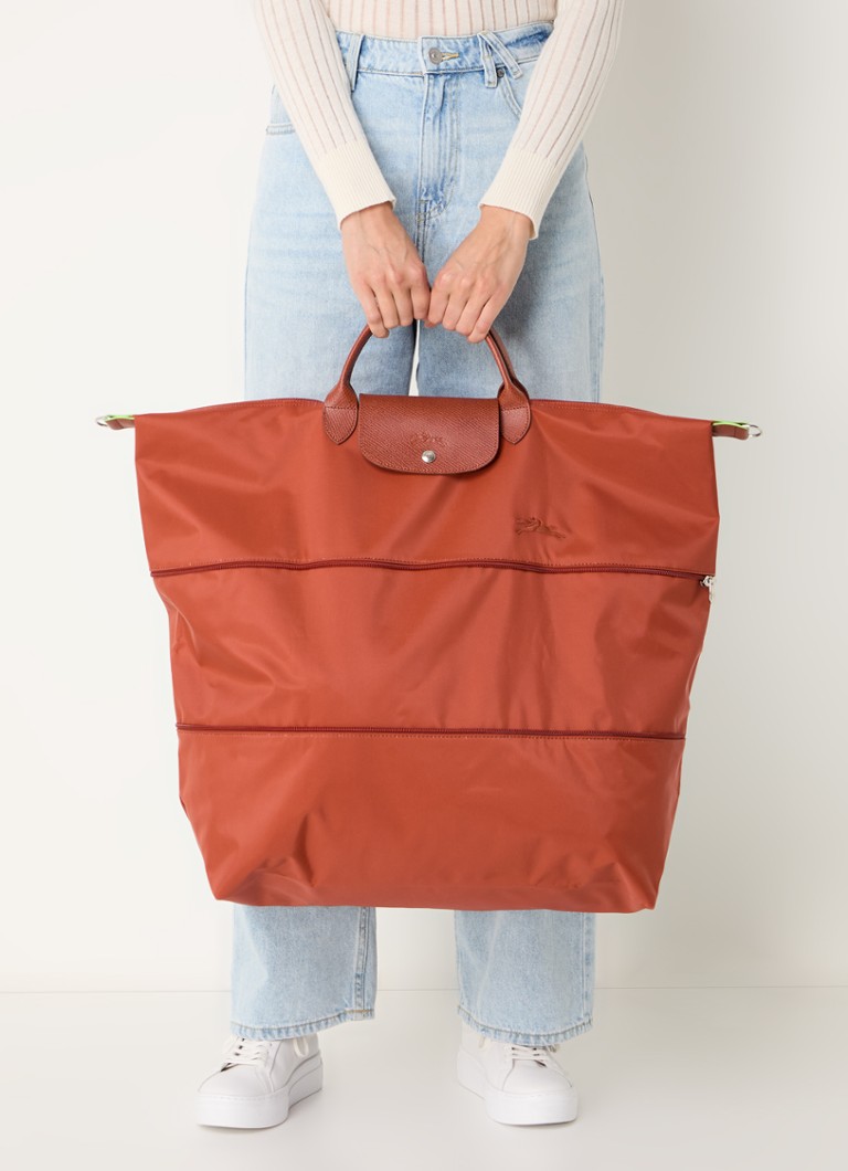 Geantă de voiaj extensibilă Longchamp Le Pliage, verde, cu detalii din piele.