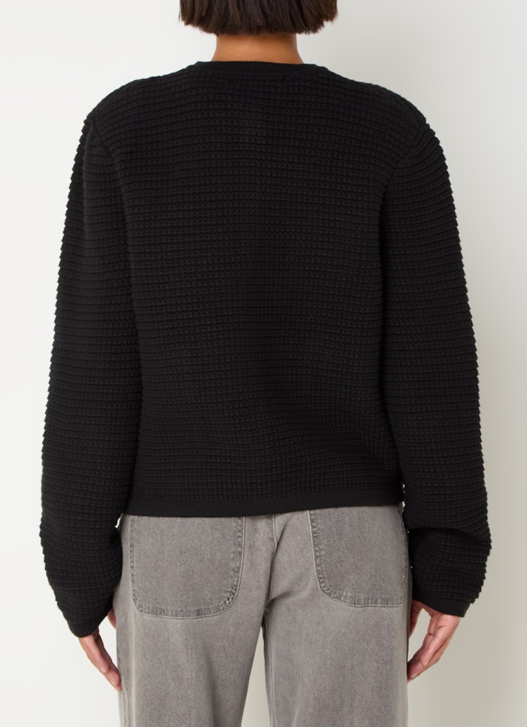 Cardigan gros tricotat de Sofie Schnoor, cu buzunare aplicate.