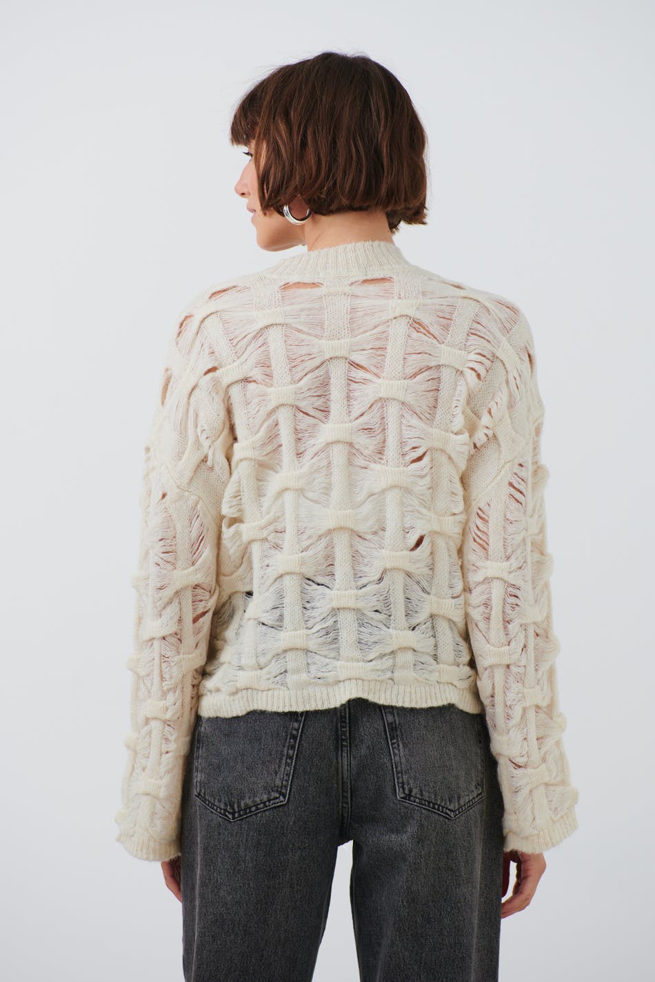 Open work knitted sweater