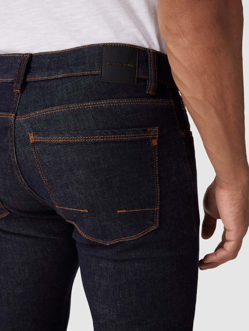 Tapered Fit Jeans mit Label-Detail Modell 'Lyon' in dunkelblau
