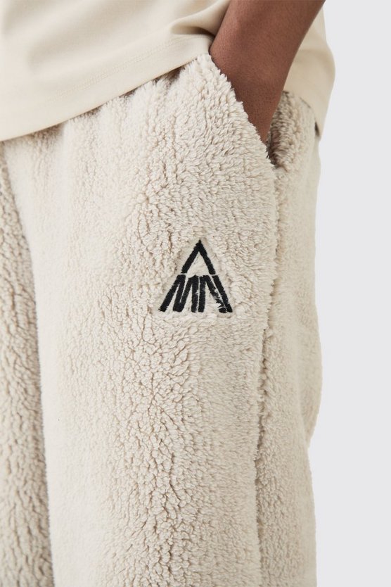 Oversize Borg-Jogginghose mit Man-Stickerei