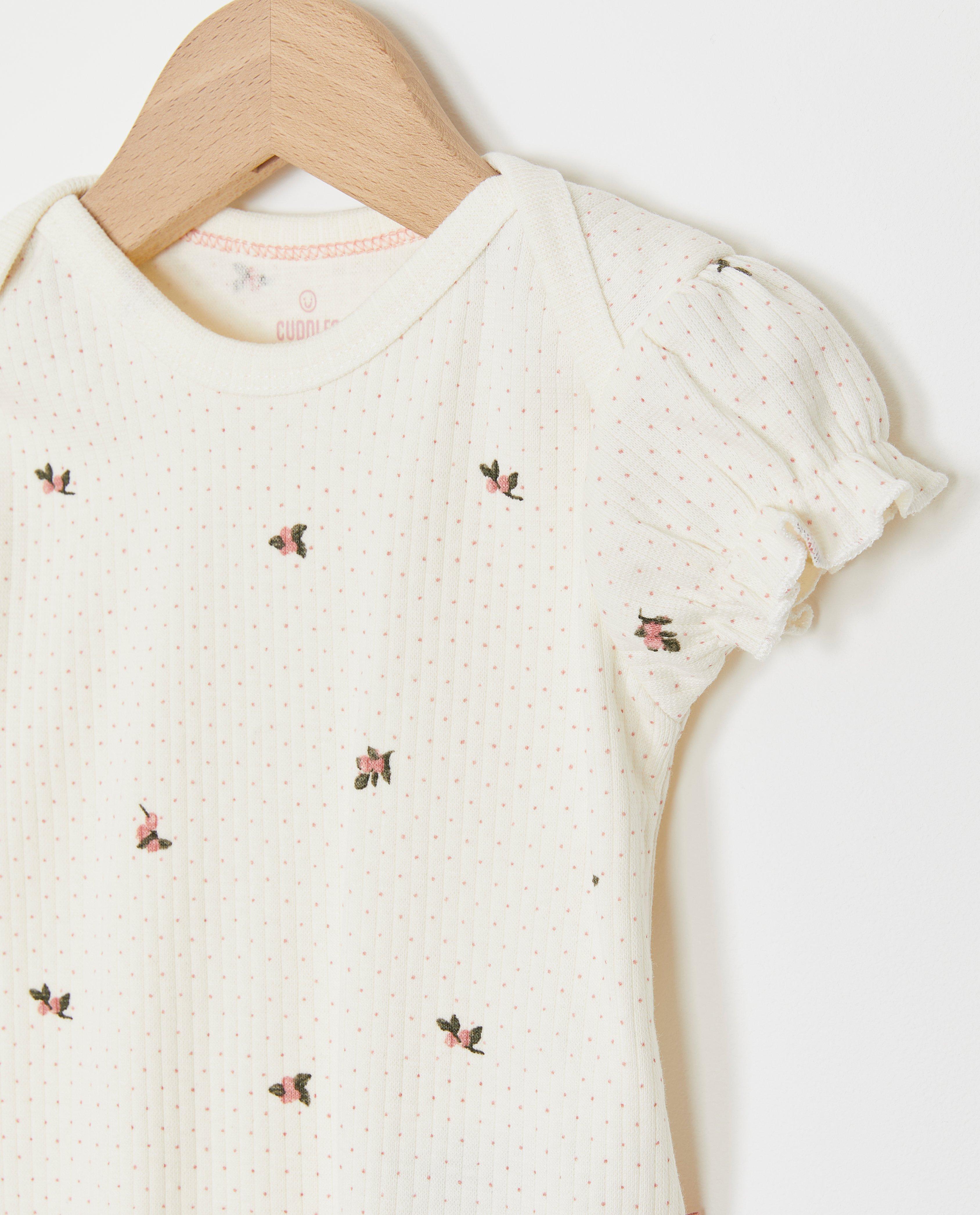 Cuddles and Smiles Romper med kuvertficka