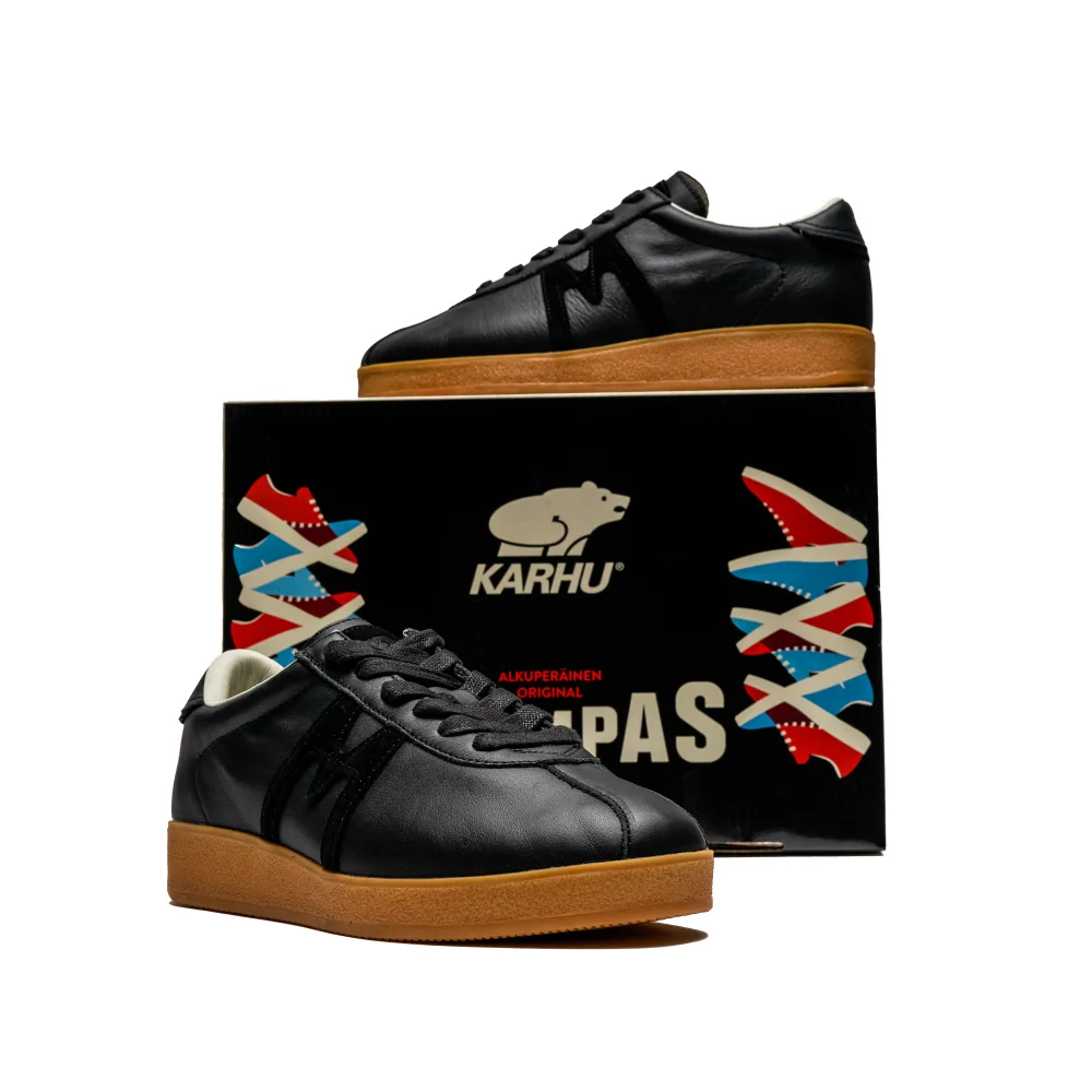 Karhu Trampas F809036 / schwarz