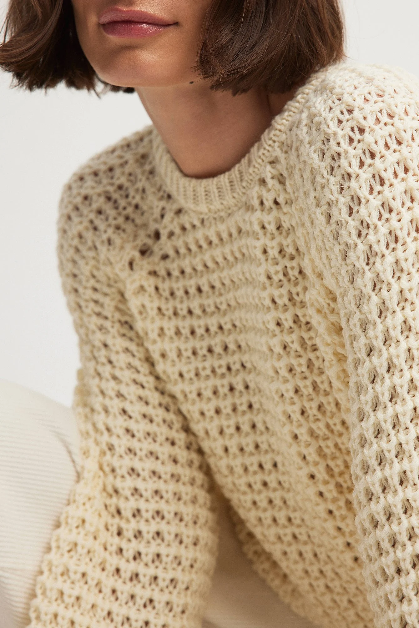 Rundhalsausschnitt Strickpullover