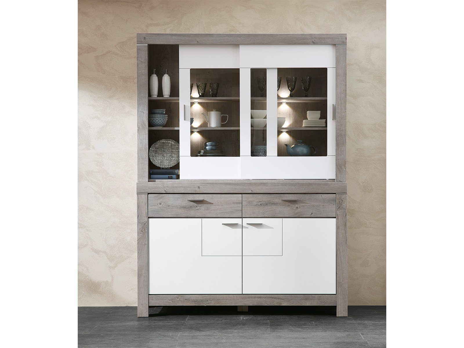 möbelando Buffet Gravesend Modernes Buffet in Haveleiche Nachbildung / Lack Laminat Weiß supermatt, Korpus aus Spanplatte, Front aus MDF bestehend aus 1 Sideboard und 1 Buffet-Aufsatz, inkl. LED-Beleuchtung. Breite 156 cm, Höhe 211 cm, Tiefe 42 cm
