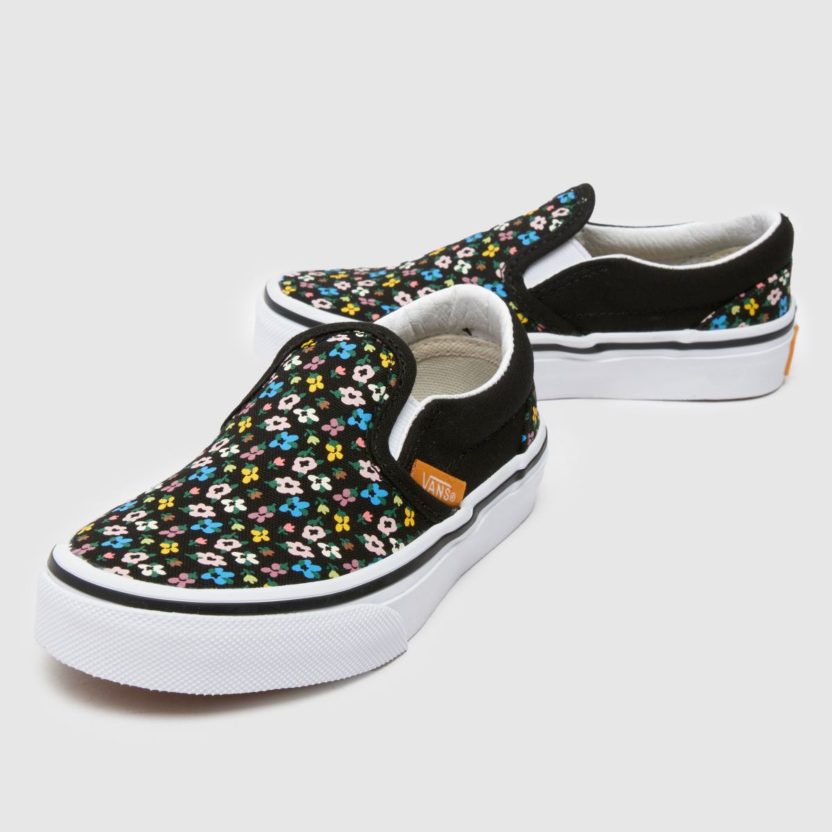 Vans svarta multifärgade klassiska slip-on flickor juniorskor