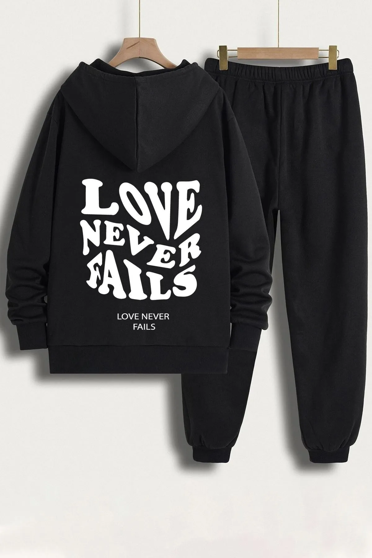 uyguntarz  Bedrucktes Unisex-Trainingsanzug-Set „Love Never Fails“.