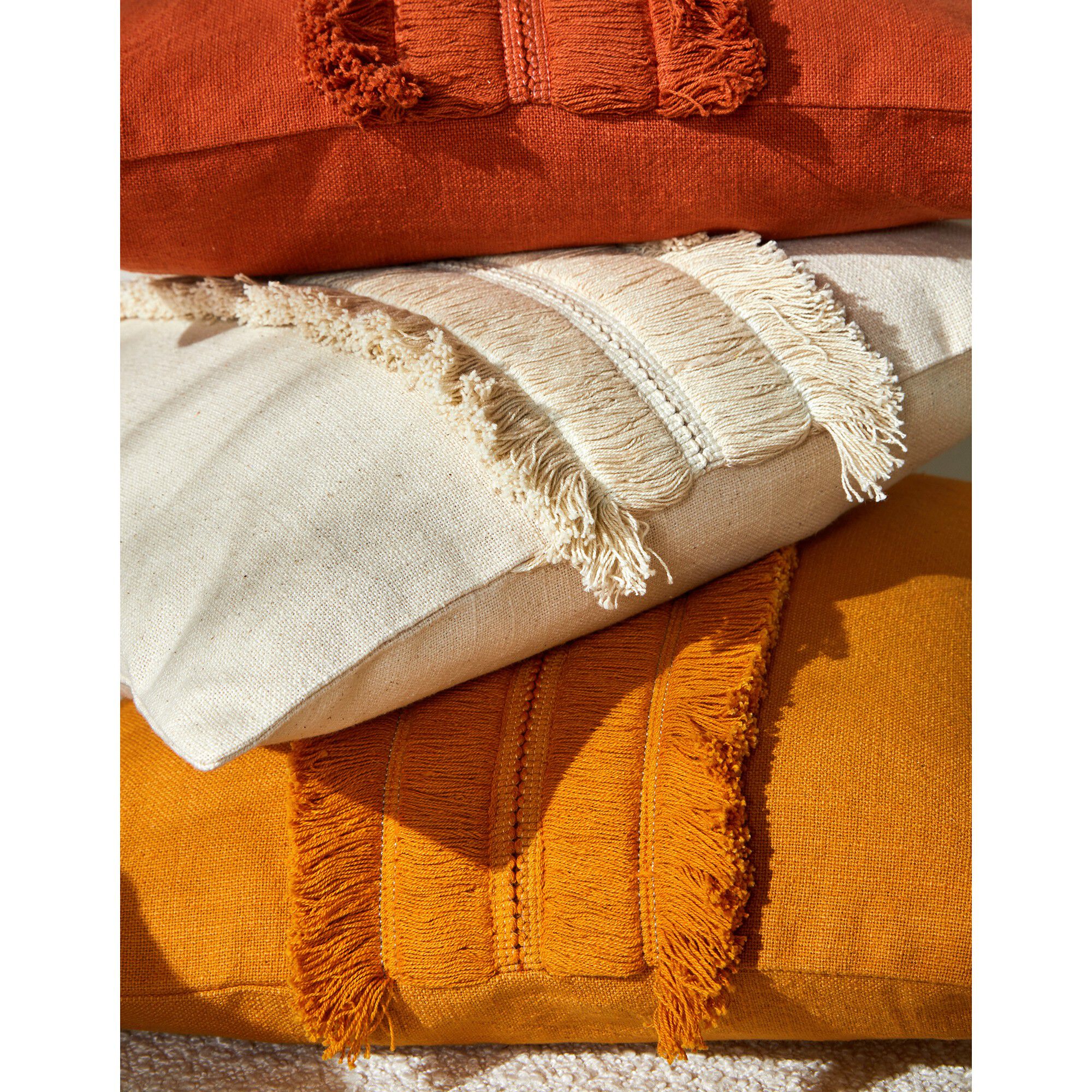 Coussin avec galon franges