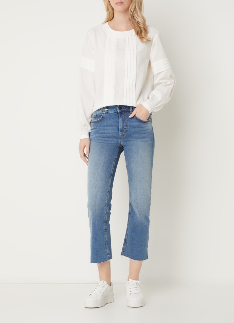 Jeans Benetton a vita media e taglio svasato, lavaggio scuro.
