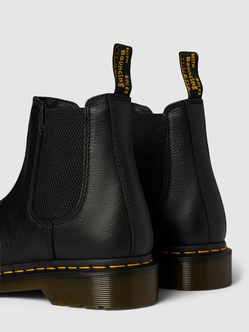 Boots mit elastischen Einsätzen und Label-Detail in schwarz