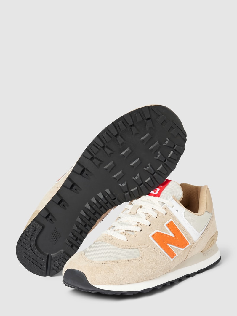 Sneaker mit Kontrastbesatz in orange