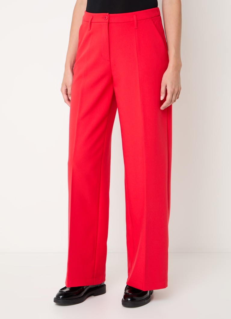 Pantaloni de vară cu talie înaltă, cu talie lată și buzunare laterale.