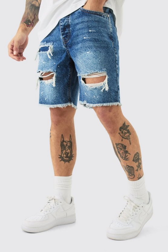 Hellblaue Slim-Fit Jeansshorts mit Rissen und Farbspritzern