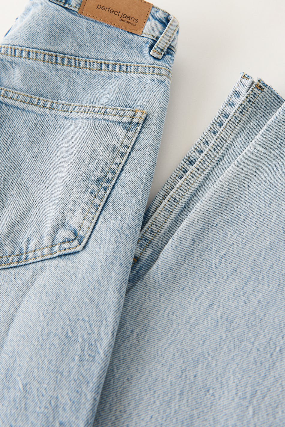 High waist tall slit jeans