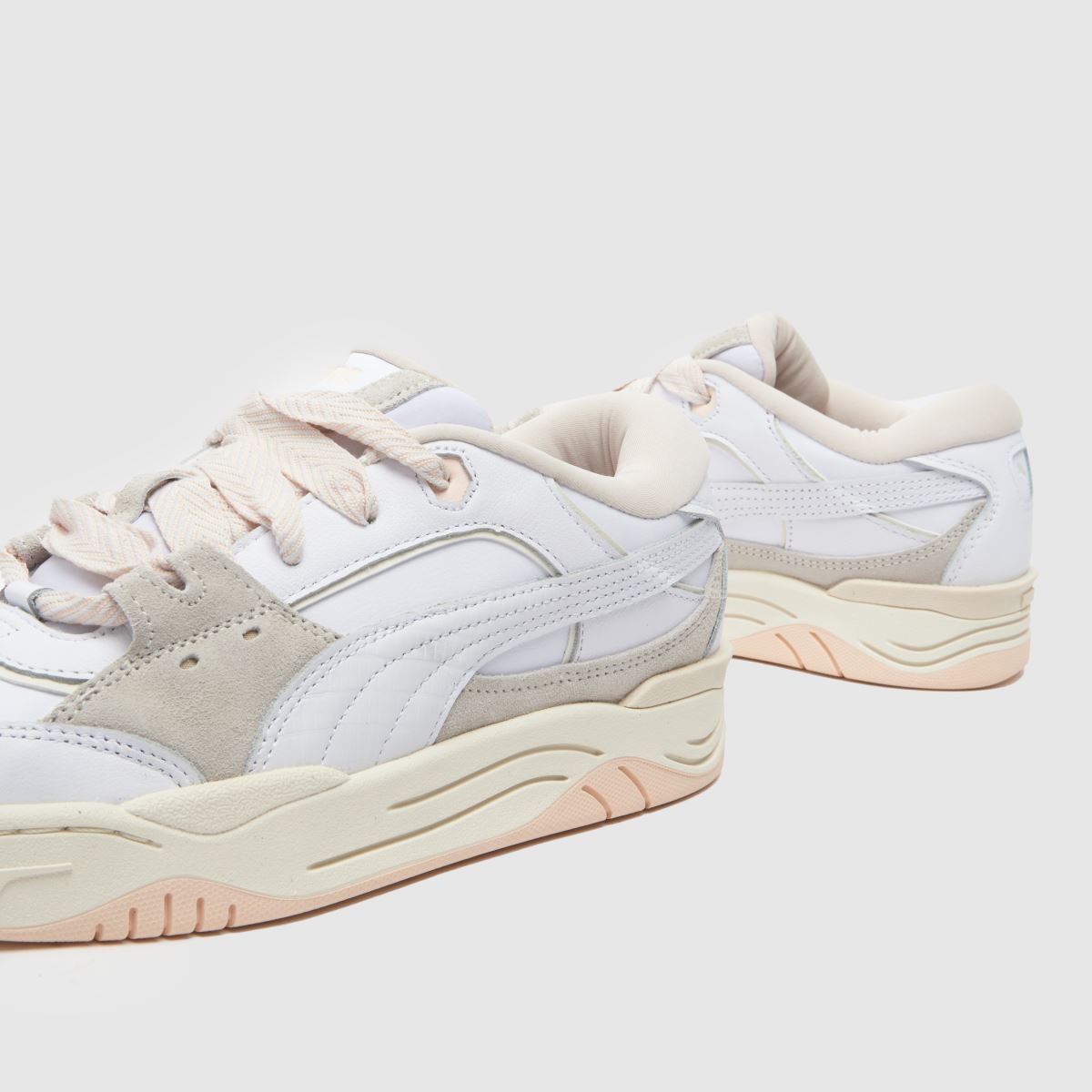 PUMA 180 träningsskor i vitt och rosa