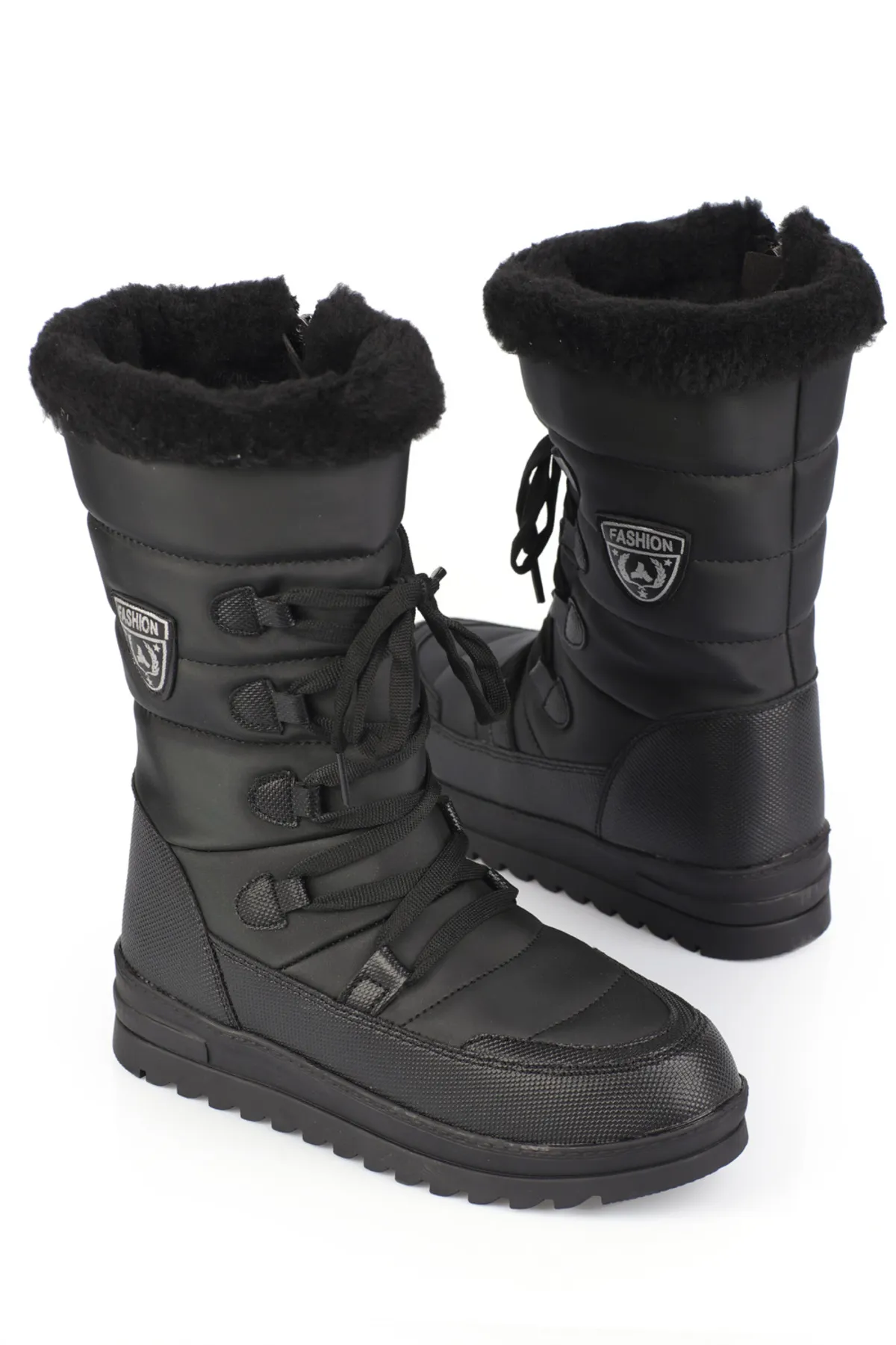 Capone Outfitters  Damen-Schneestiefel mit Trak-Sohle, seitlichem Reißverschluss, Pelzkragen, Schnürung und Fallschirmstoff