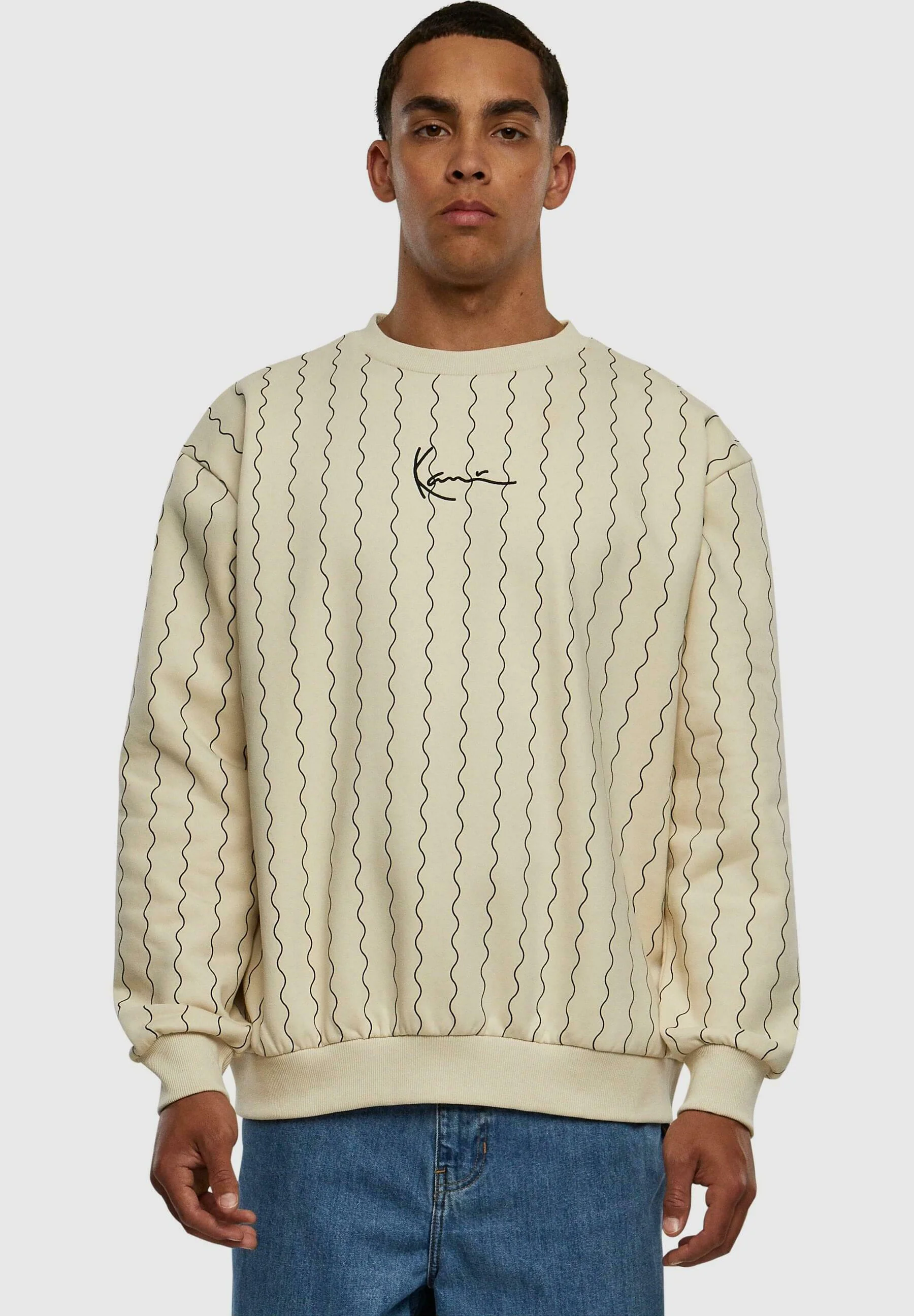 Sudadera Karl Kani con cuello redondo, rayas ziczac y firma pequeña