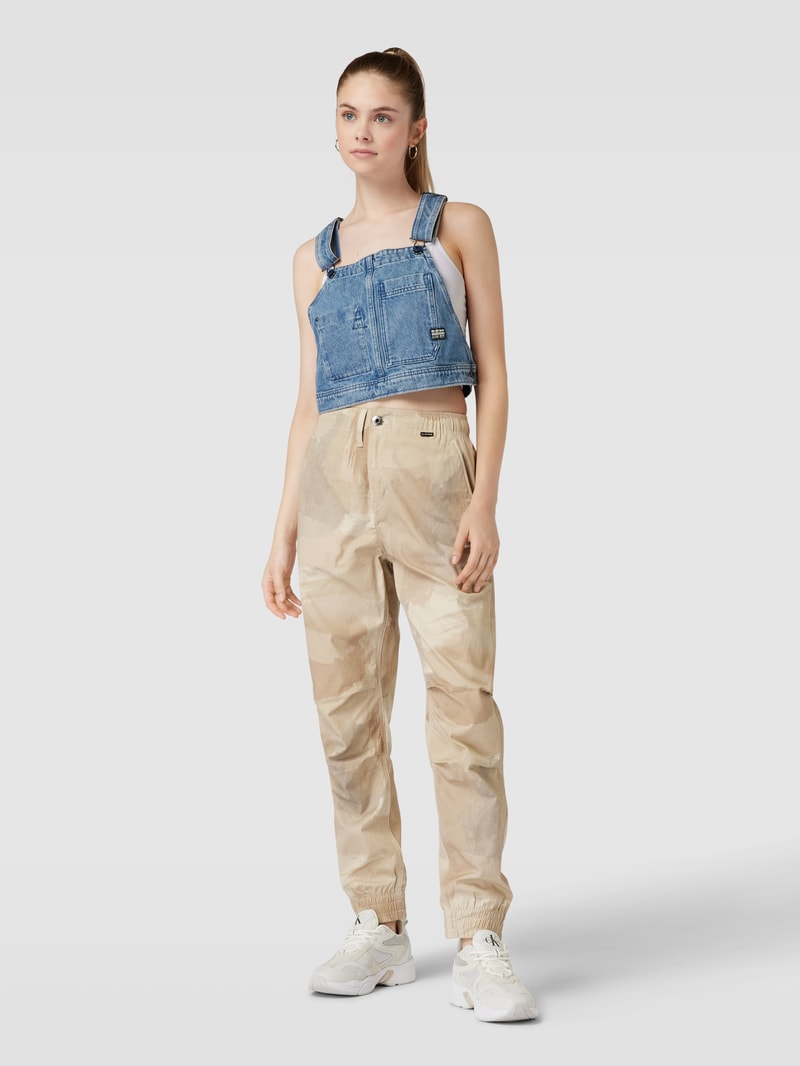 Jeansweste im Used-Look mit Label-Detail in jeans