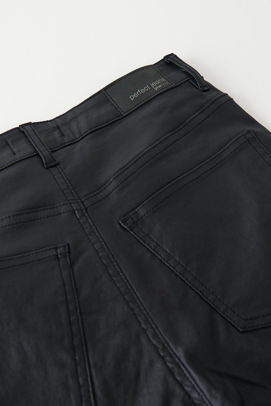 Coated bootcut jeans