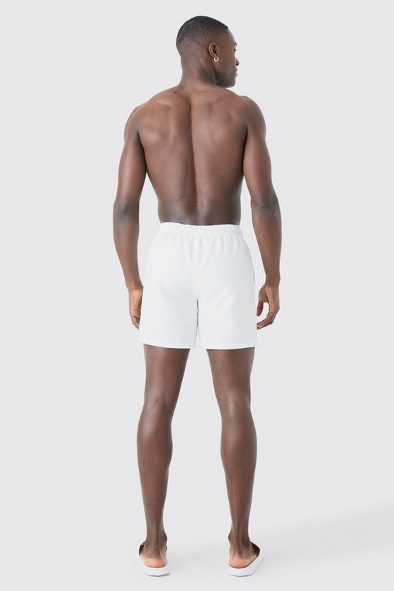 Man Signature mittellange Badehose