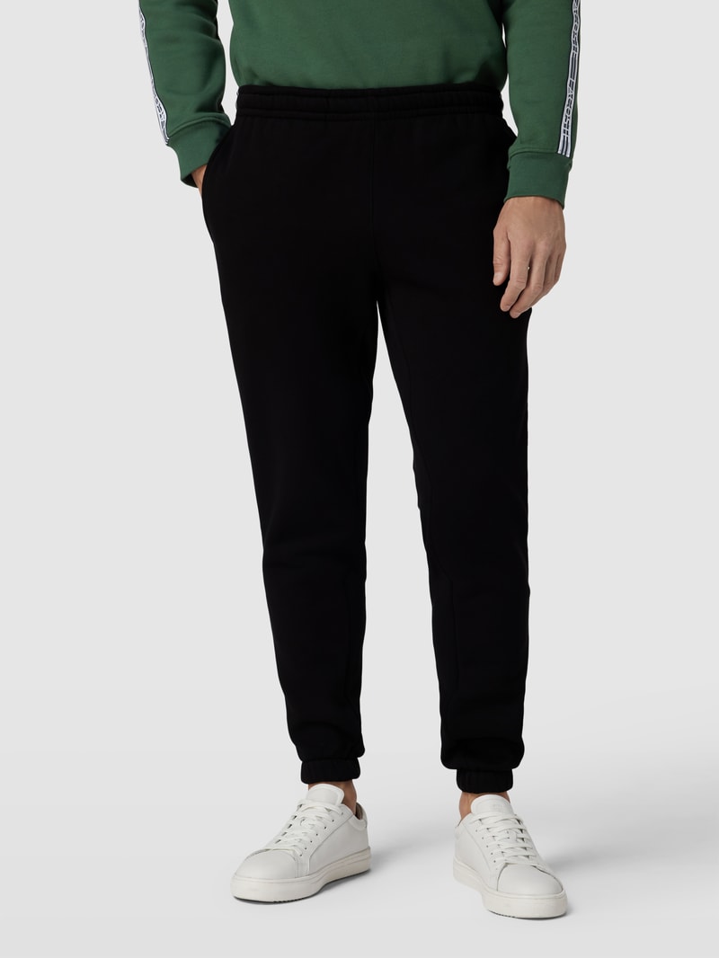Sweatpants mit Label-Streifen Modell 'TAPE' in schwarz