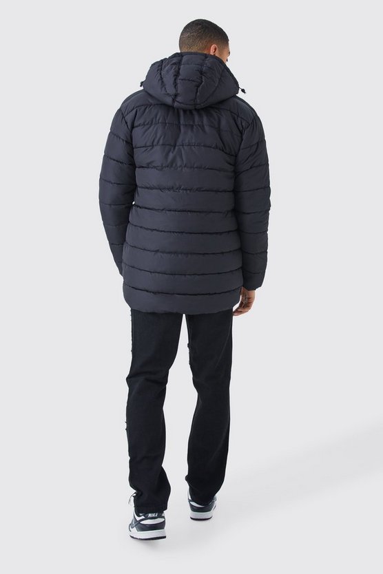 Lange Steppjacke mit Kapuze