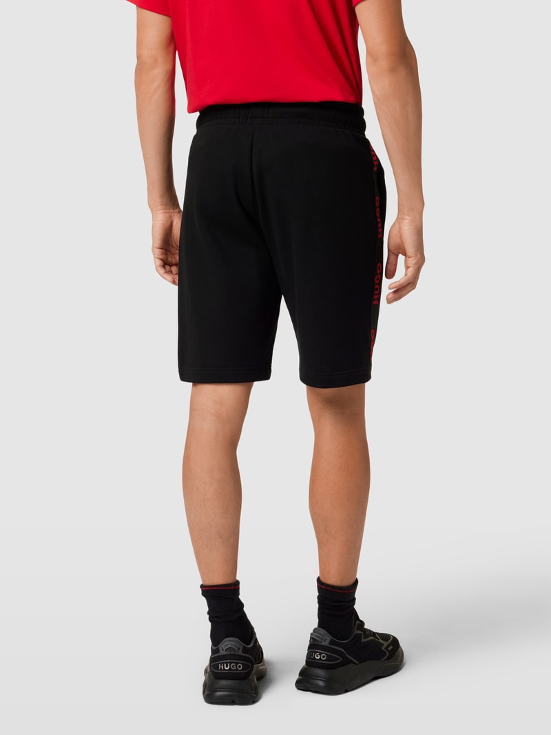Sweatshorts mit elastischem Bund in schwarz