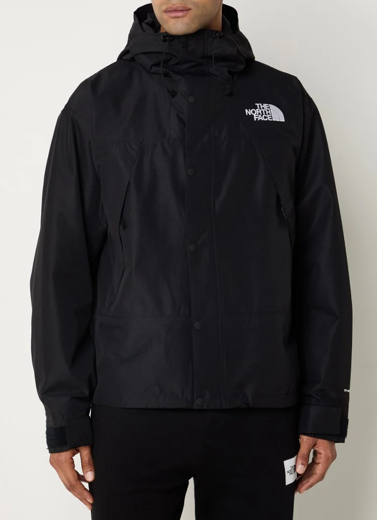 The North Face Mountain -takki vetoketjullisilla taskuilla ja logolla