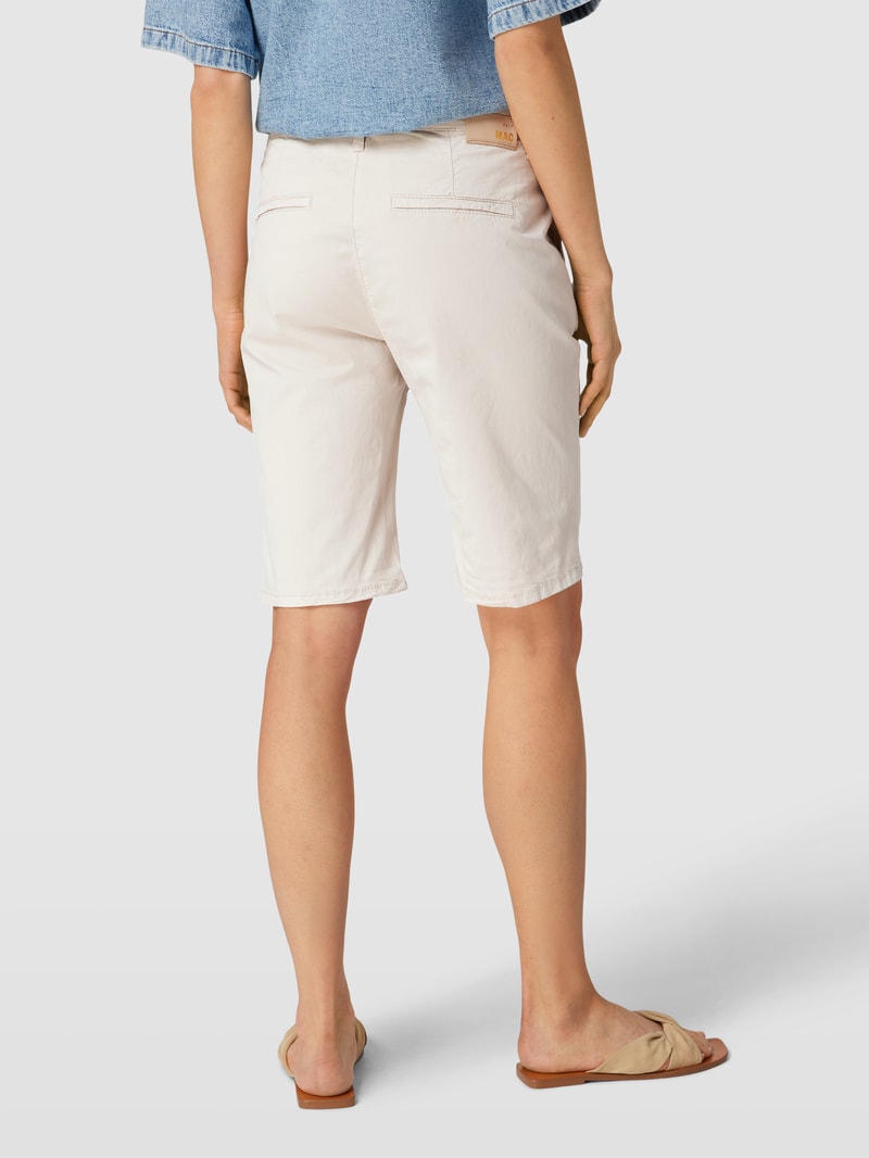 Chino-Shorts mit Allover-Print in kitt