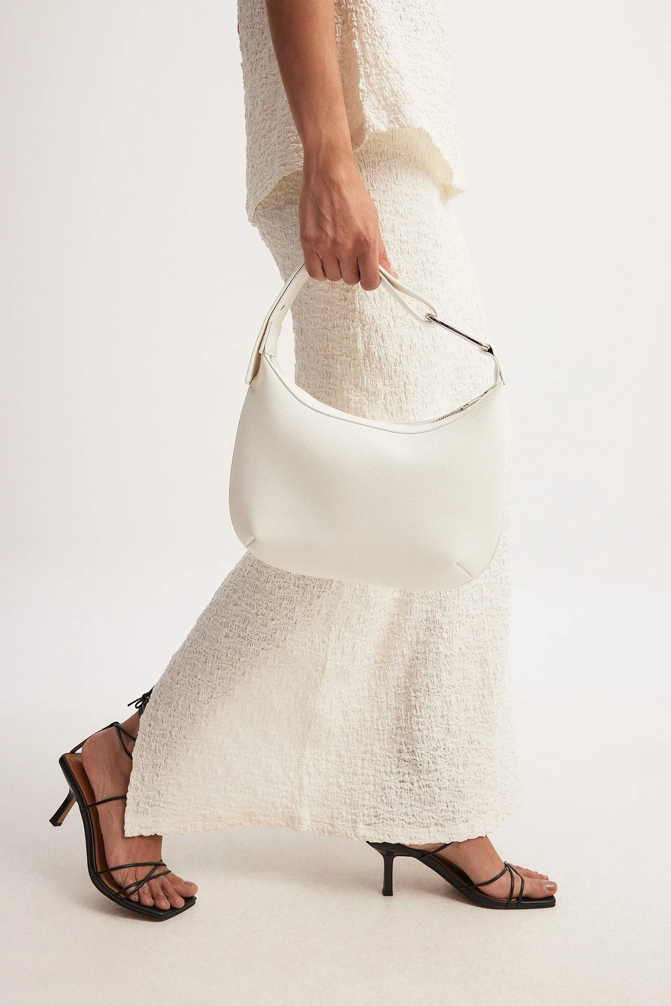 Abgerundete Mini-Handtasche