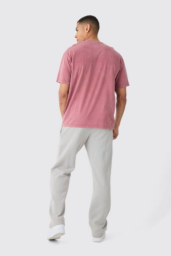 Zerrissenes Oversize T-Shirt mit Acid-Waschung und Official-Stickerei