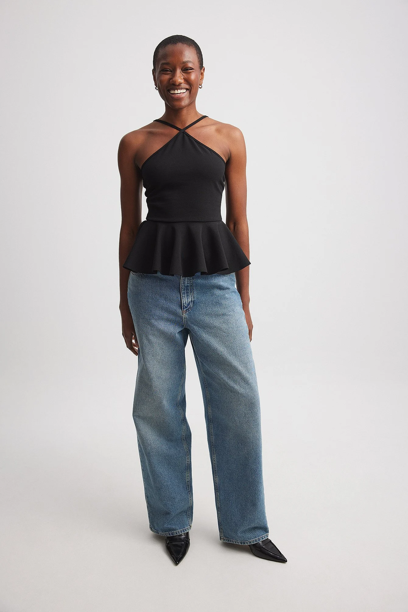 Peplum-Oberteil mit Neckholder-Ausschnitt