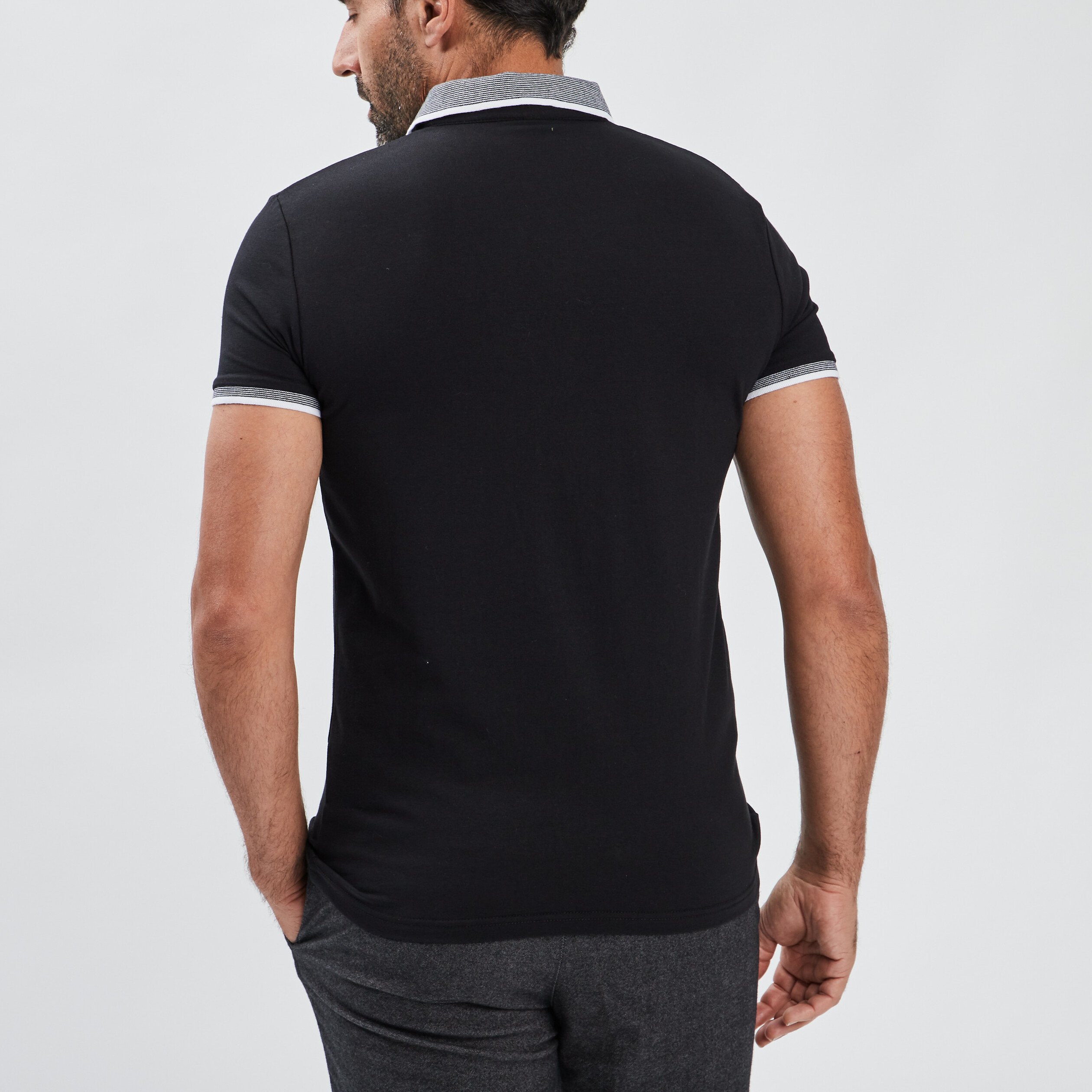 Polo ajusté manches courtes noir homme | La Halle