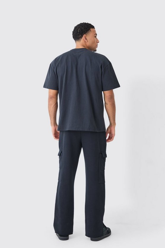 Gerade Jogginghose mit geteiltem Saum und zerrissener Applikation