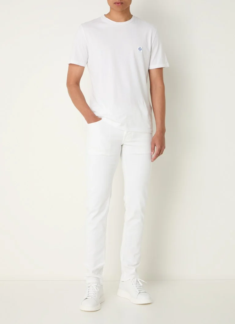 Blugi slim fit Nick de la Jacob Cohen, cu efect uzat.