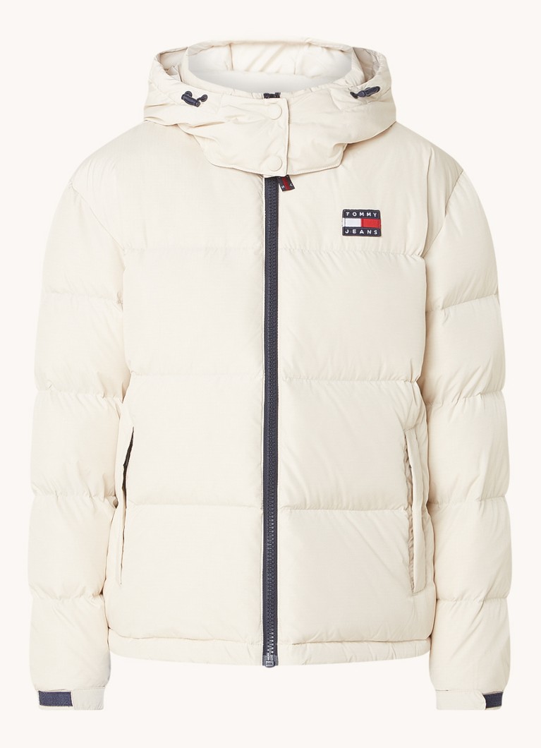 Prošívaná bunda Tommy Hilfiger s péřovou výplní a kapsami na zip