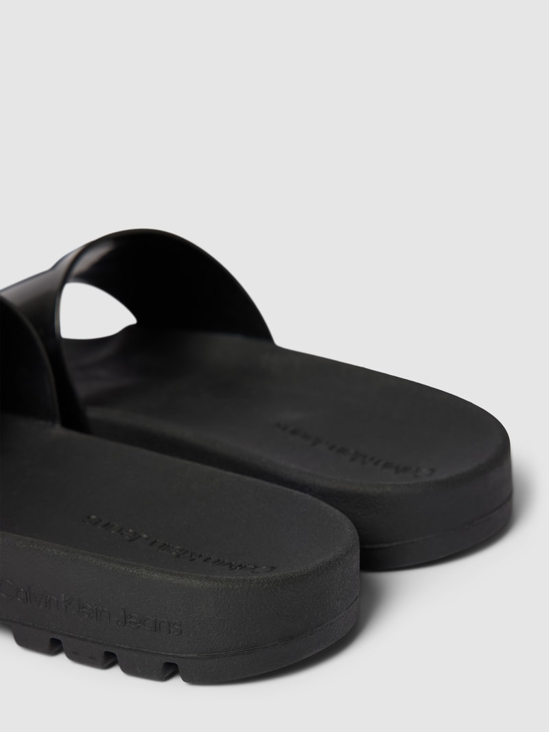 Slides mit Logo-Print Modell 'TRUCK' in schwarz