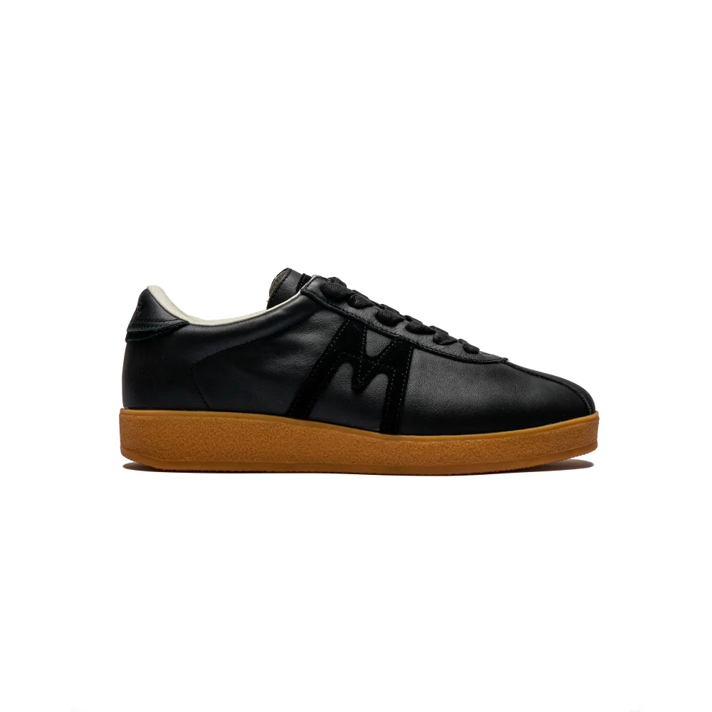 Karhu Trampas F809036 / schwarz