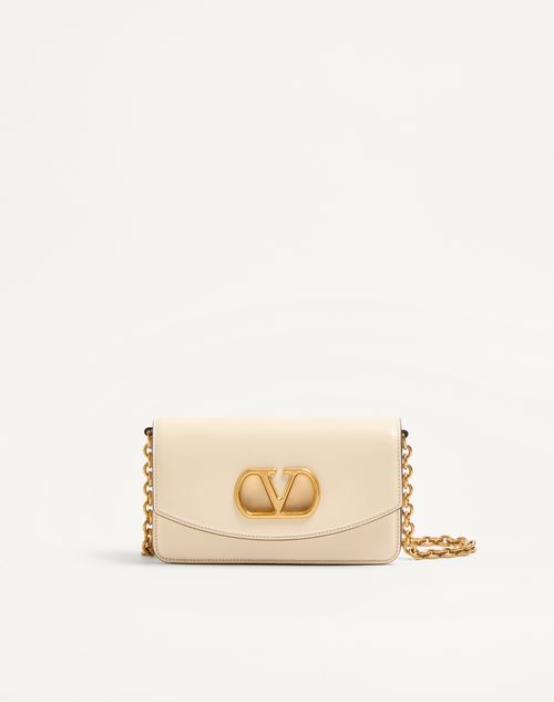 Clutch Vain da Valentino Garavani em couro de bezerro brilhante